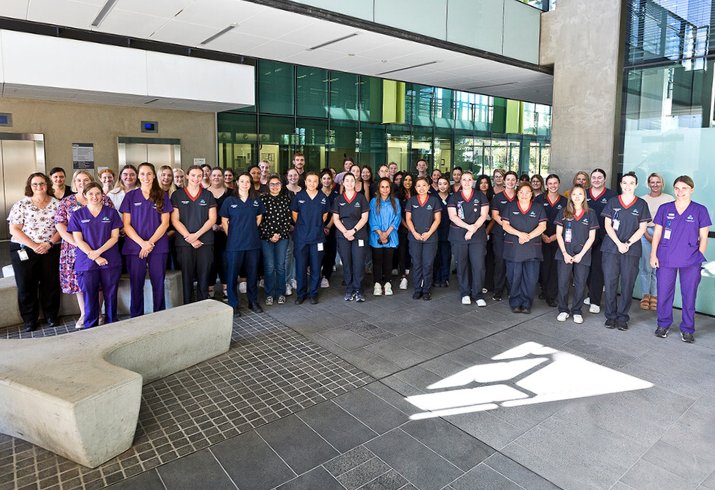 FSFHG nursing and midwifery graduates standing together smiling